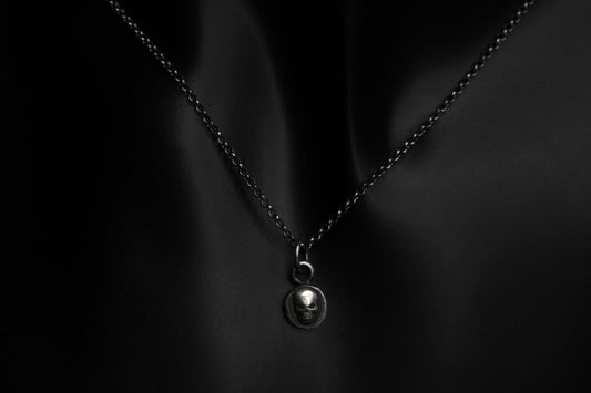 Tiny Sterling Silver Crypt Skull Pendant