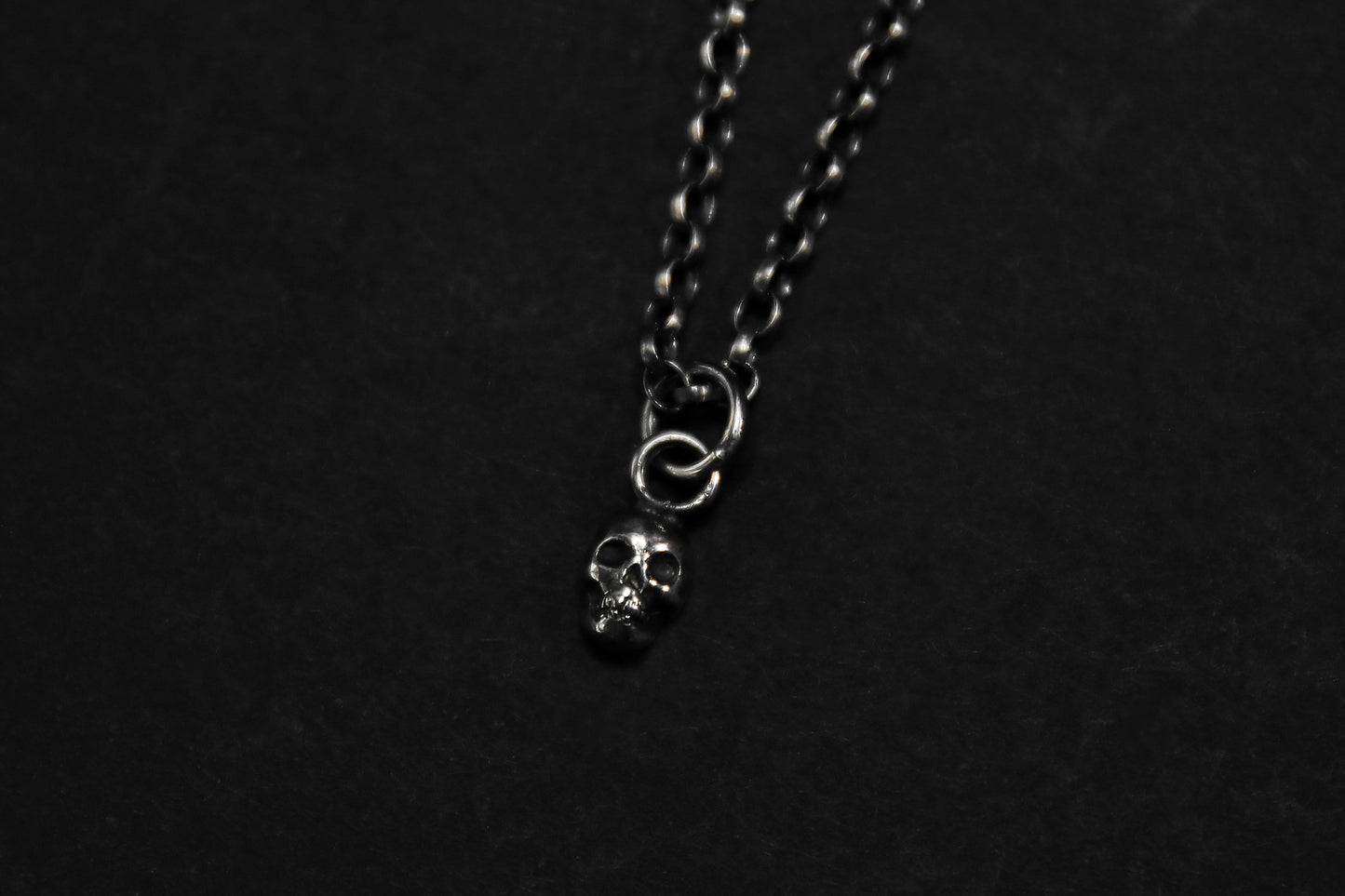 Tiny Silver Skull Pendant