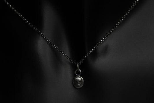 Tiny Sterling Silver Vampire Skull Pendant