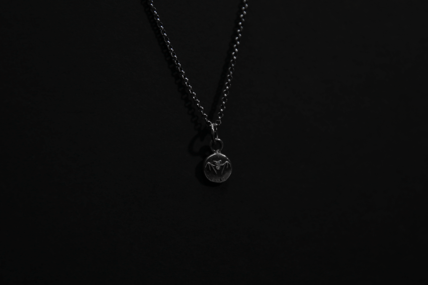 Tiny Sterling Silver Vampire Bat Pendant