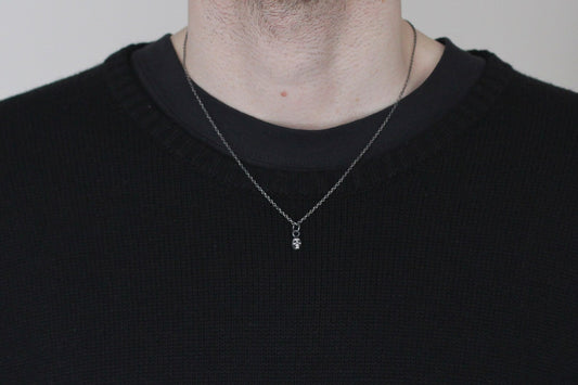 Tiny Silver Skull Pendant