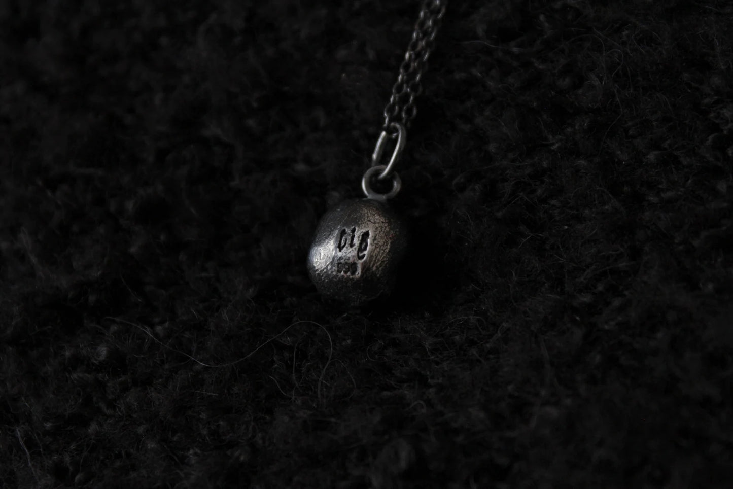 Silver Ossuary Skull Pendant