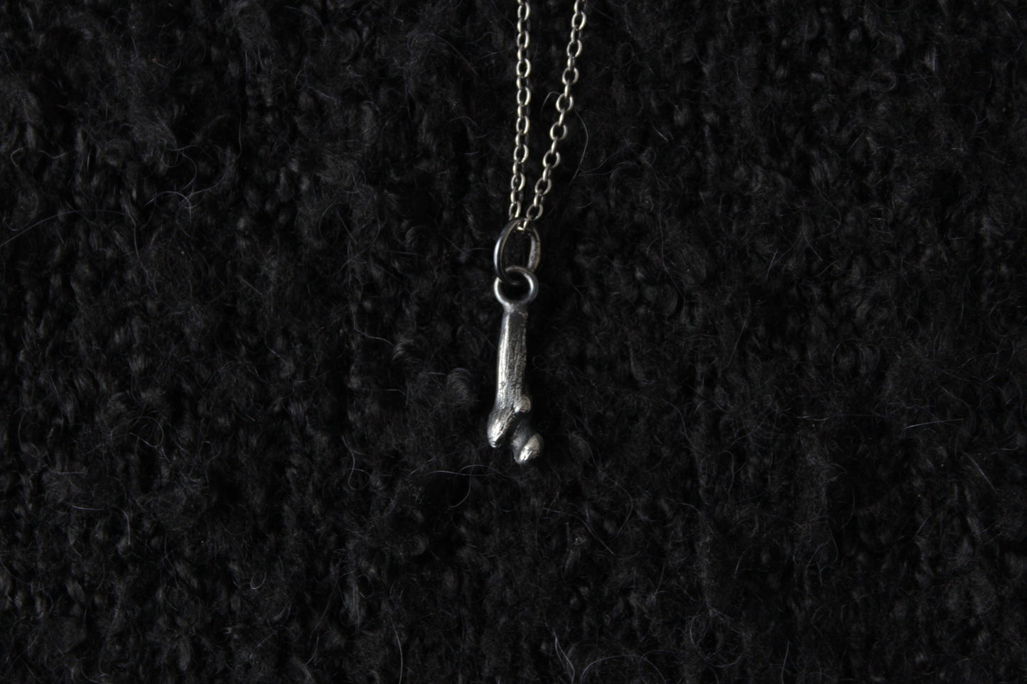 Tiny Silver Ossuary Bone Pendant