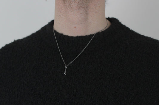 Tiny Silver Ossuary Bone Pendant