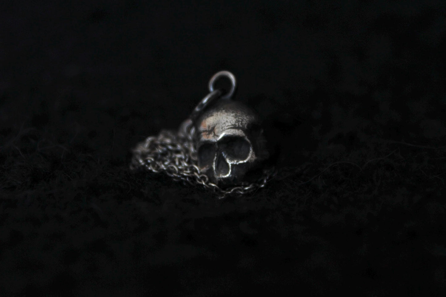 Silver Ossuary Skull Pendant