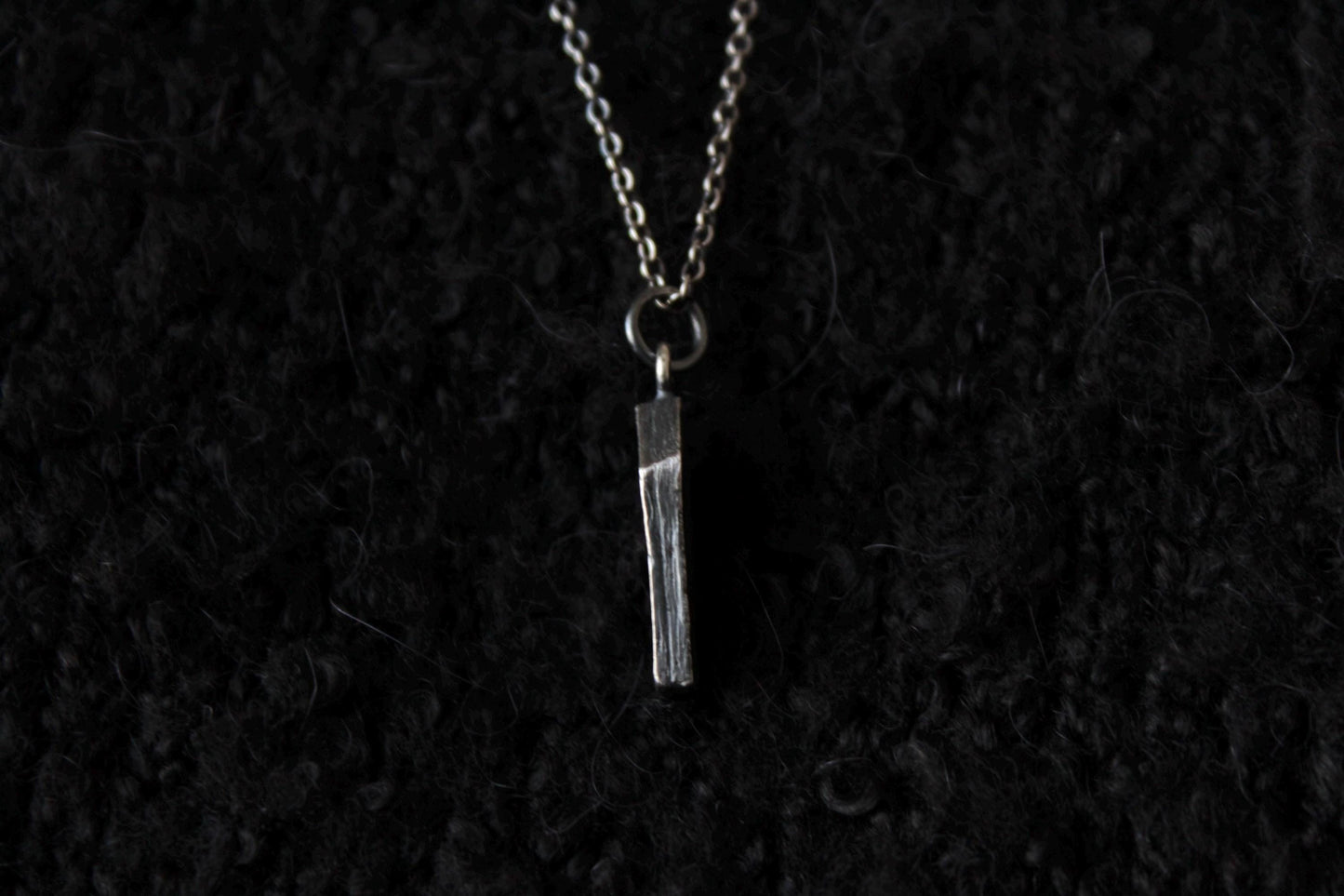 The Clad in Black Silver Casket Pendant