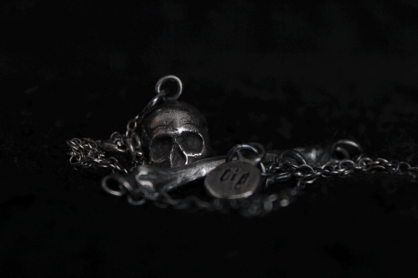 The Silver Ossuary Bundle - Silver Ossuary Skull Pendant & Silver Ossuary Bone Bracelet