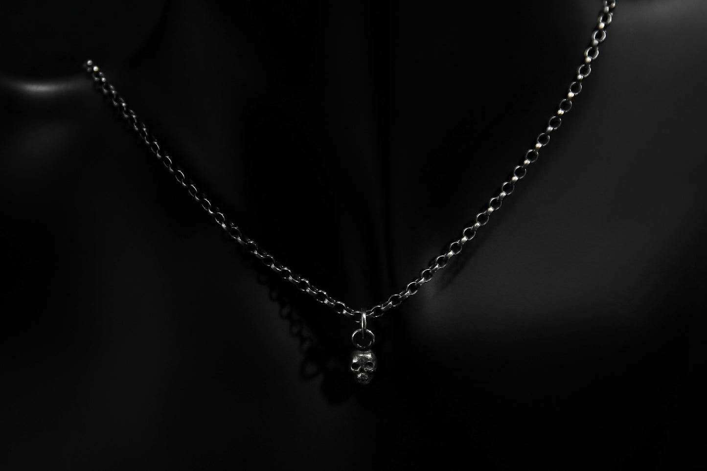 Tiny Silver Skull Pendant