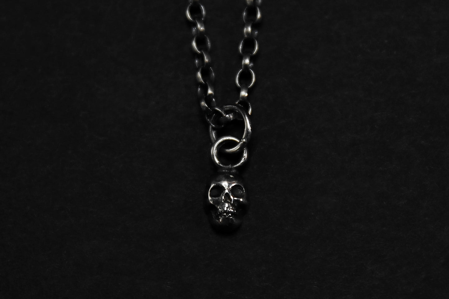 Tiny Silver Skull Pendant