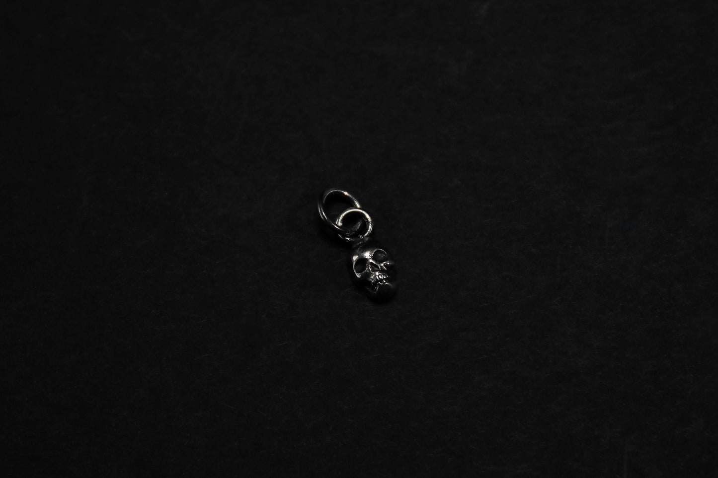 Tiny Silver Skull Pendant