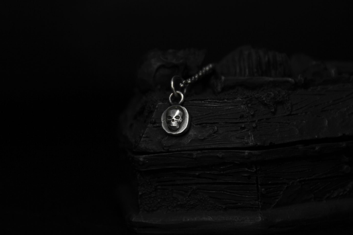 Tiny Sterling Silver Crypt Skull Pendant