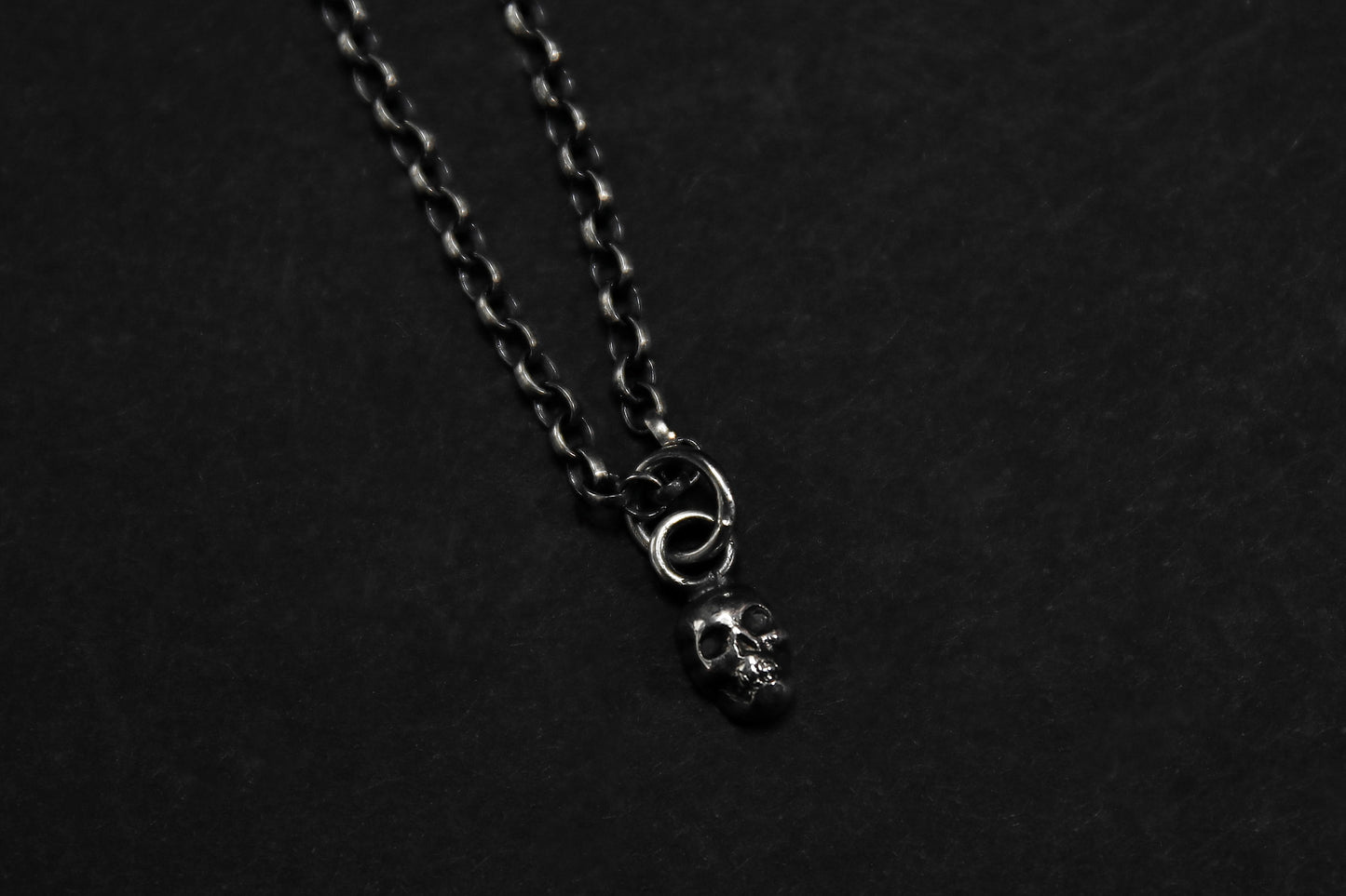 Tiny Silver Skull Pendant