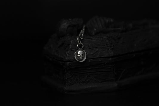 Tiny Sterling Silver Crypt Skull Pendant