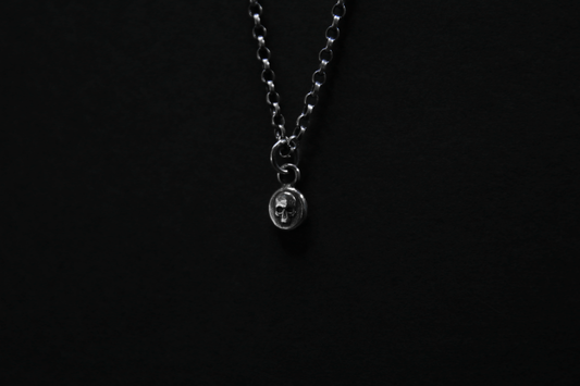 Tiny Sterling Silver Vampire Skull Pendant