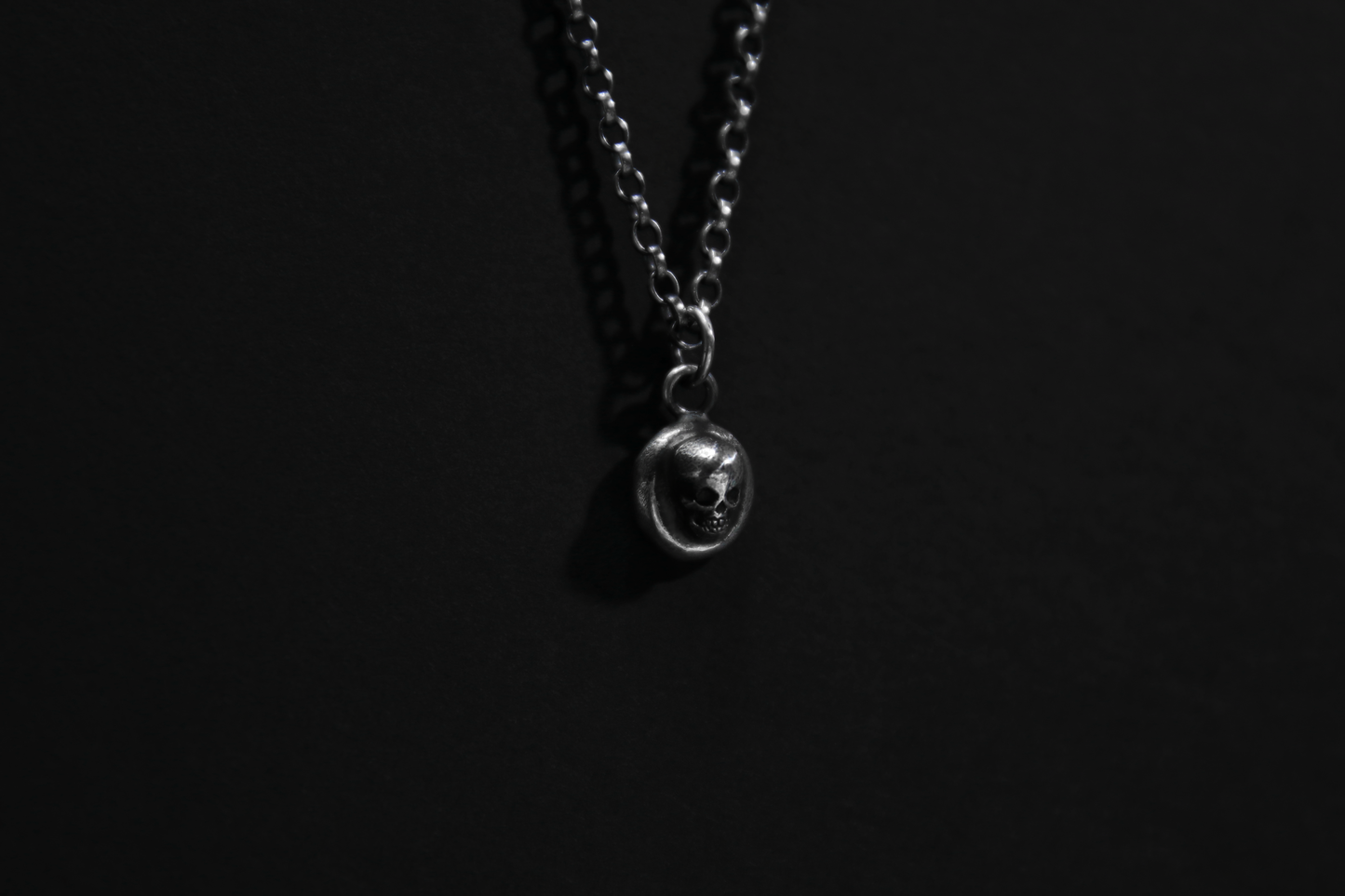 The Silver Cemetery Skull Pendant