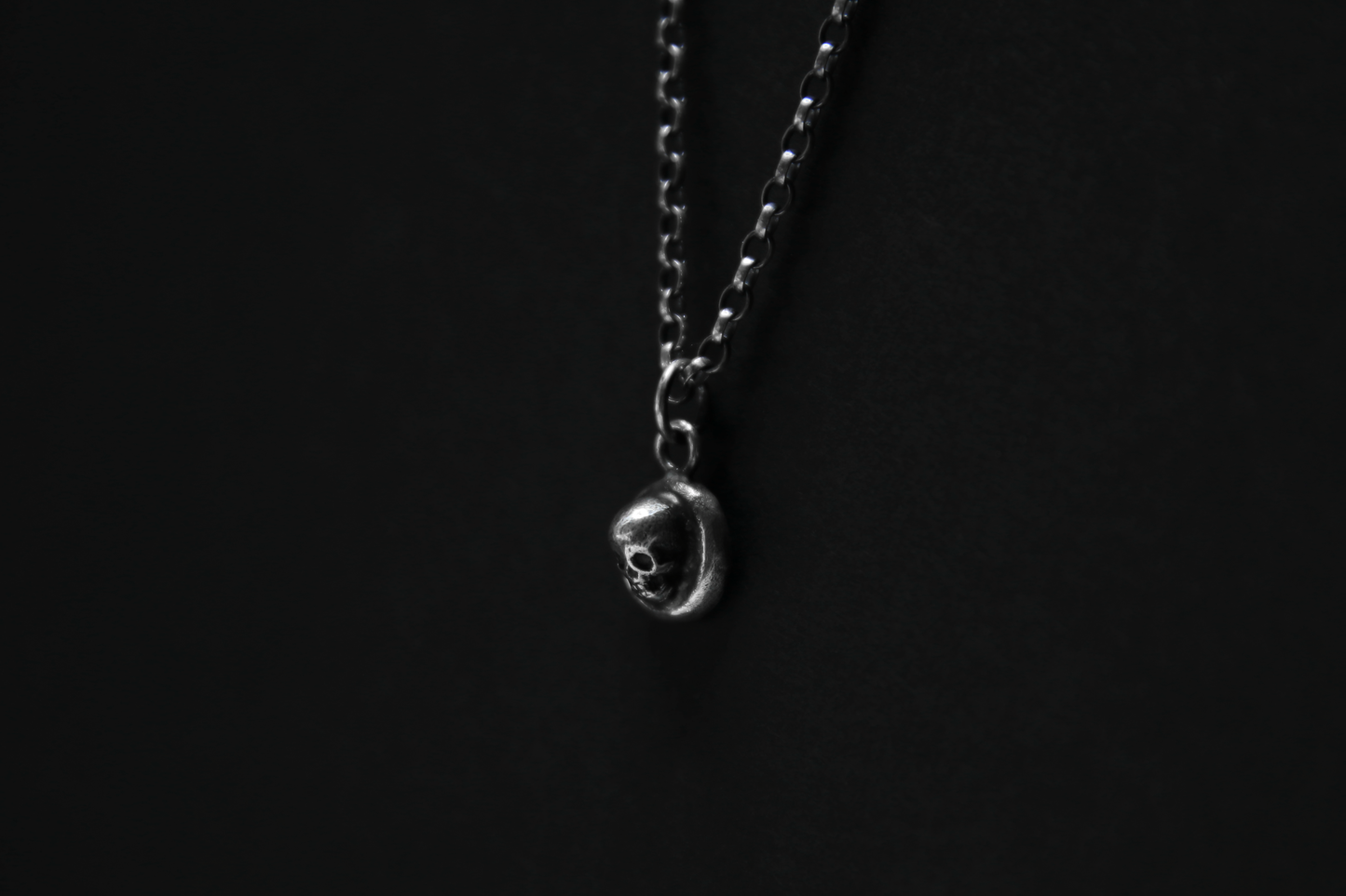 The Silver Cemetery Skull Pendant