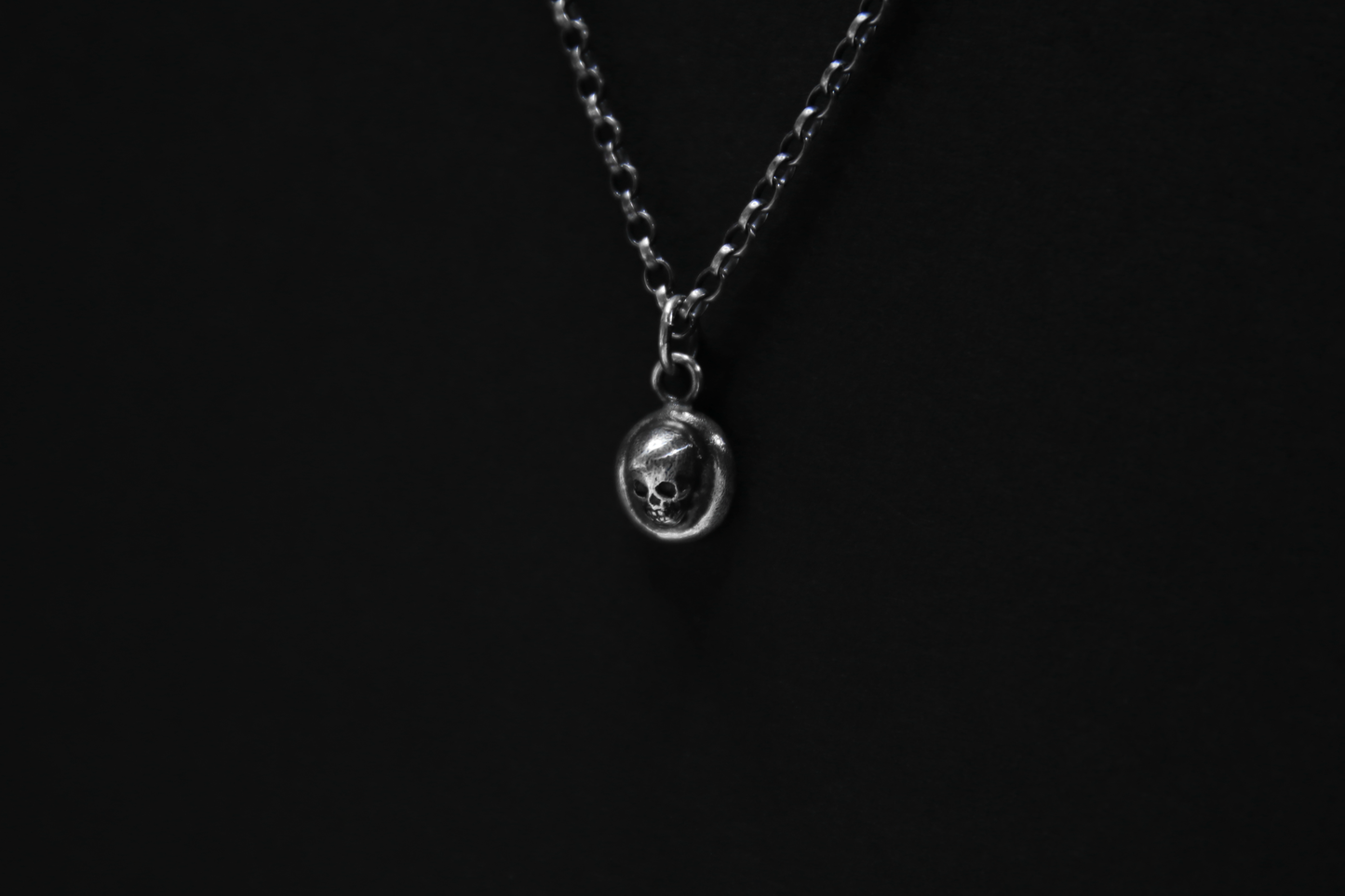 The Silver Cemetery Skull Pendant