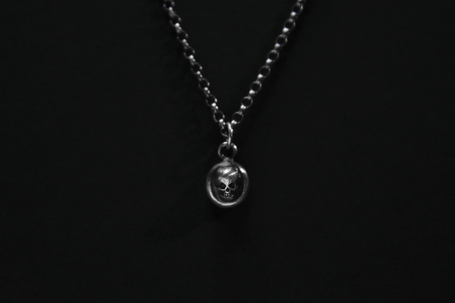 The Silver Cemetery Skull Pendant