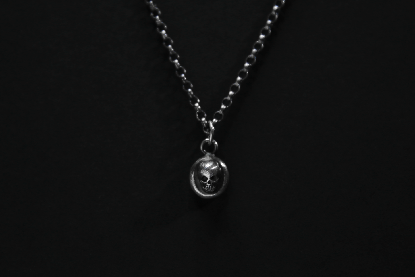 The Silver Cemetery Skull Pendant