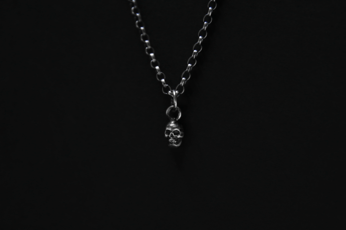 Tiny Silver Skull Pendant
