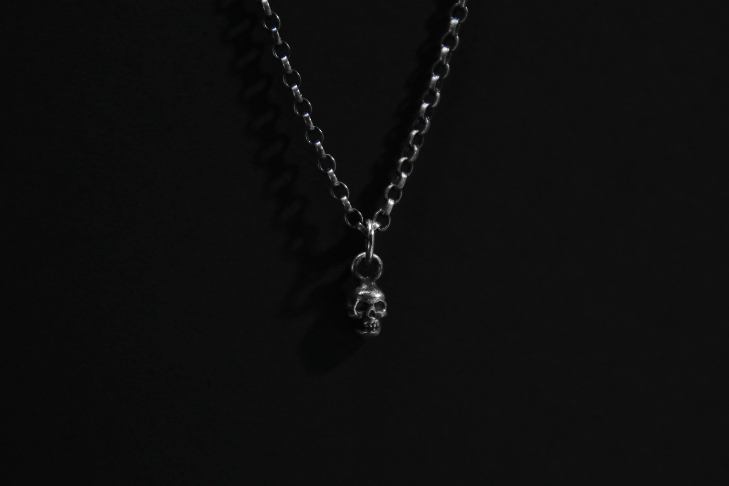 Tiny Silver Skull Pendant