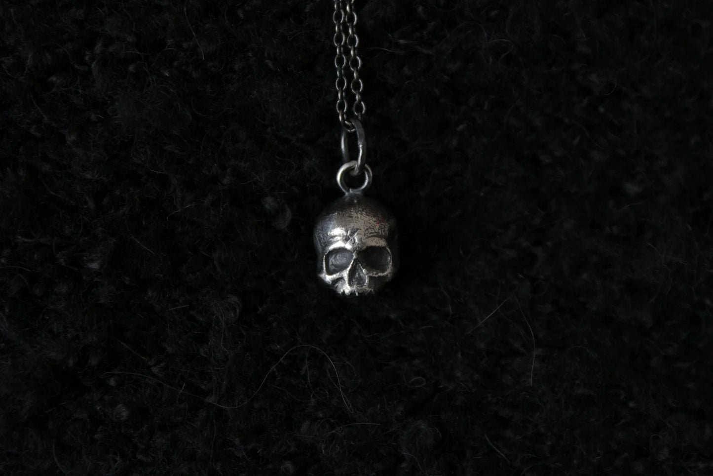 Silver Ossuary Skull Pendant