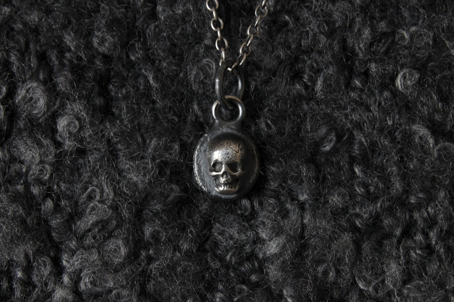 The Silver Cemetery Skull Pendant