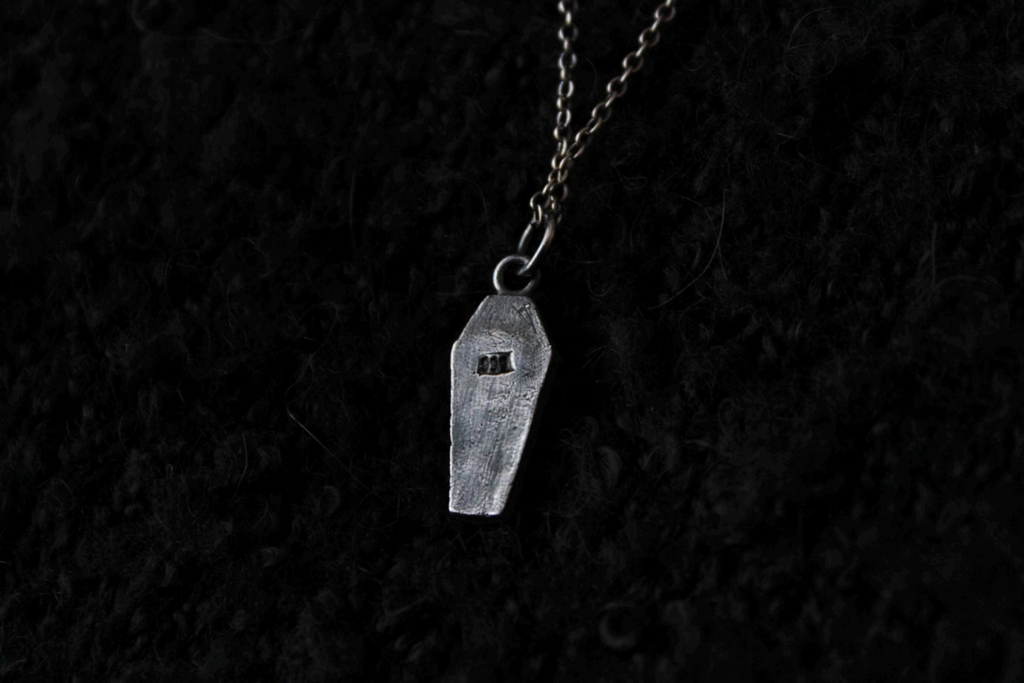The Clad in Black Silver Casket Pendant
