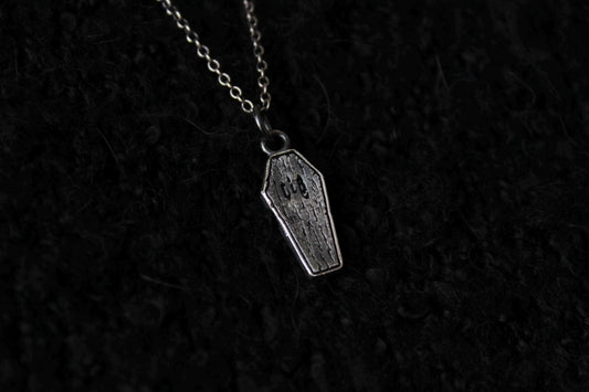 The Clad in Black Silver Casket Pendant