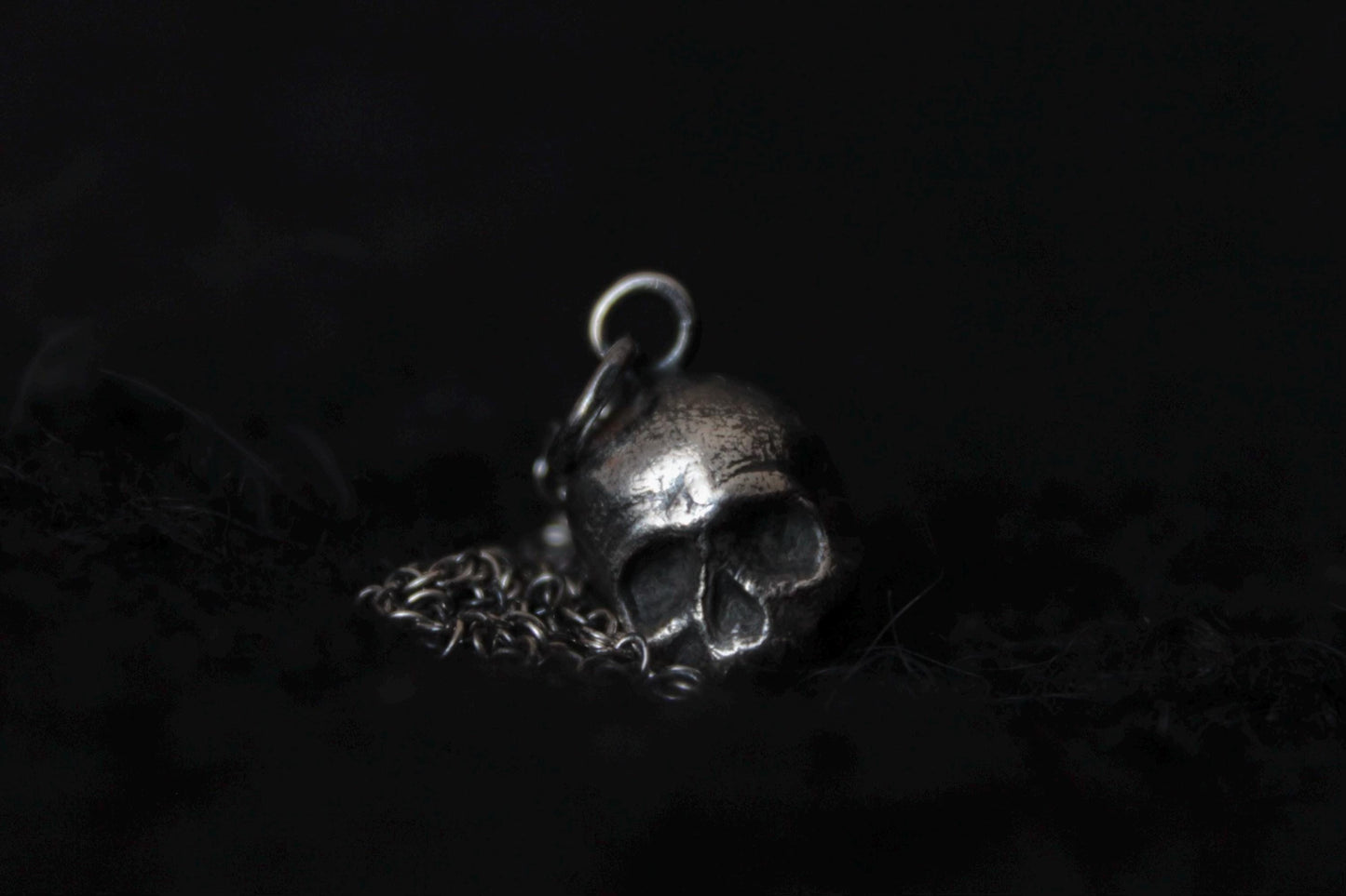Silver Ossuary Skull Pendant