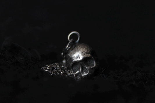 Silver Ossuary Skull Pendant