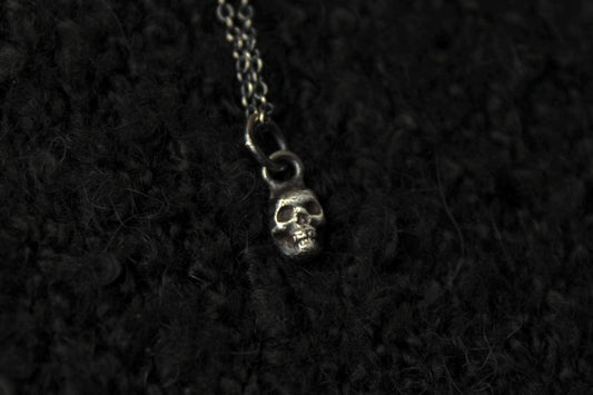 Tiny Silver Skull Pendant